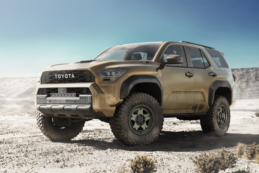 Automotive 3D rendering of wheel on off-road vehicle in rugged terrain
